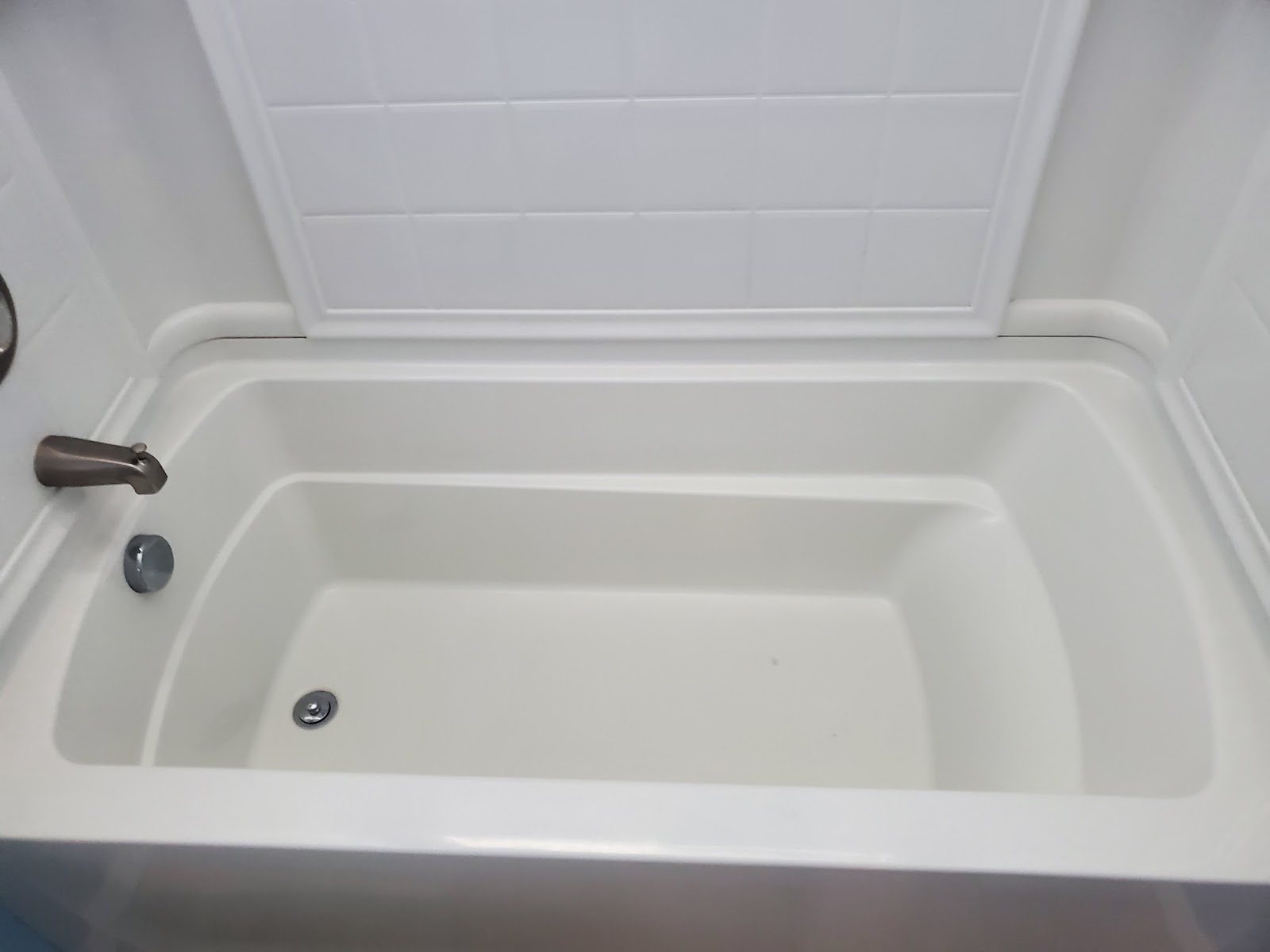 Spotless white bathtub after deep cleaning in an Idaho home